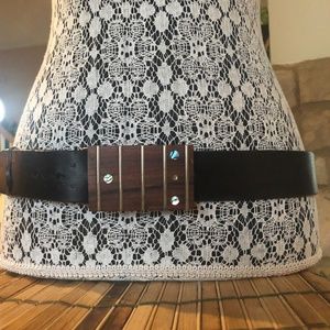 Custom brown leather belt with a Guitar Fret Bucle